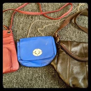 Three cross body pocketbooks